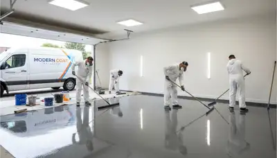 Professional epoxy floor coating in a Tulsa OK garage by local house-painting experts